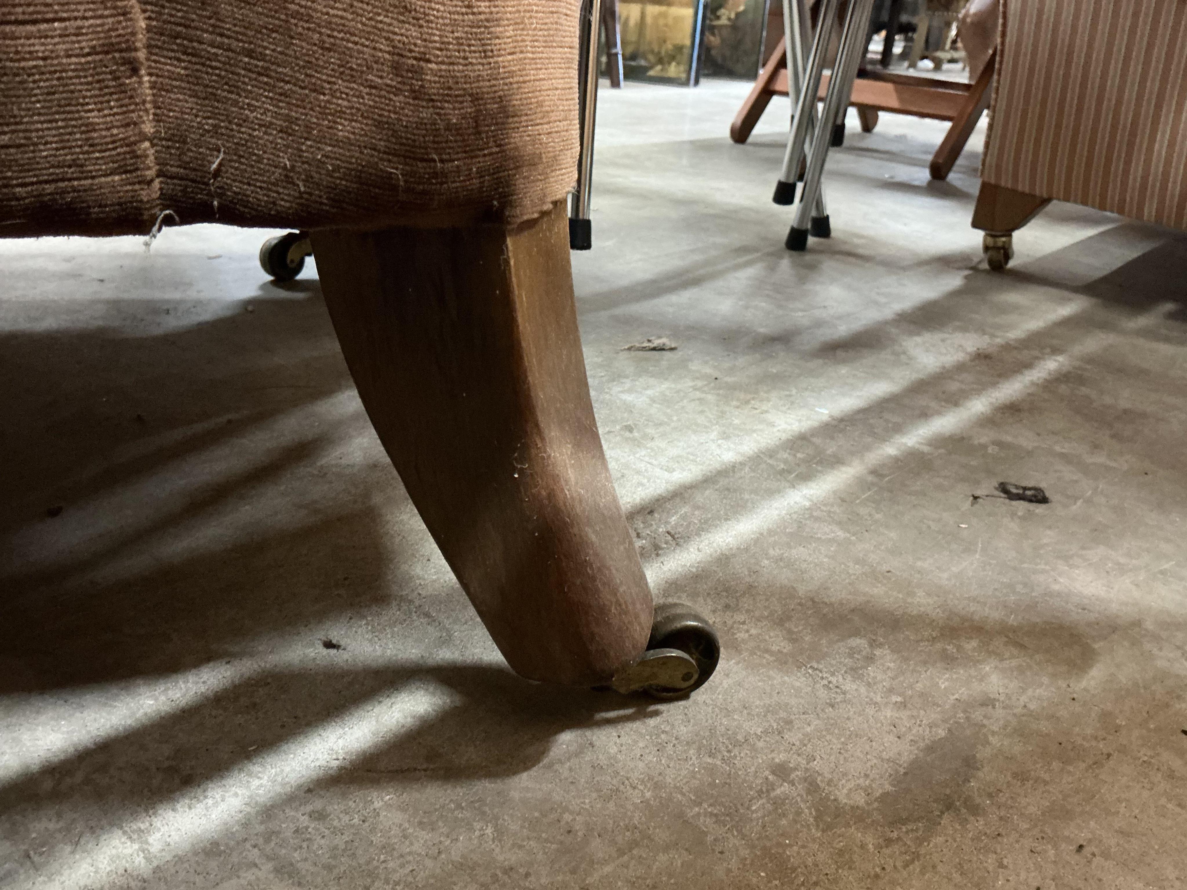 A Victorian upholstered Chesterfield settee, width 206cm, depth 82cm, height 66cm